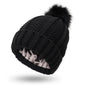 Bonnet en laine doublé de satin avec pompon en fausse fourrure