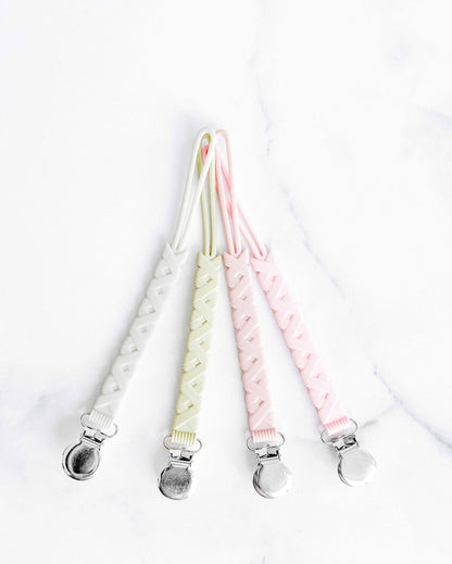 Creation Coco Lyly silicone pacifier holder in pastel colors for stylish and practical use