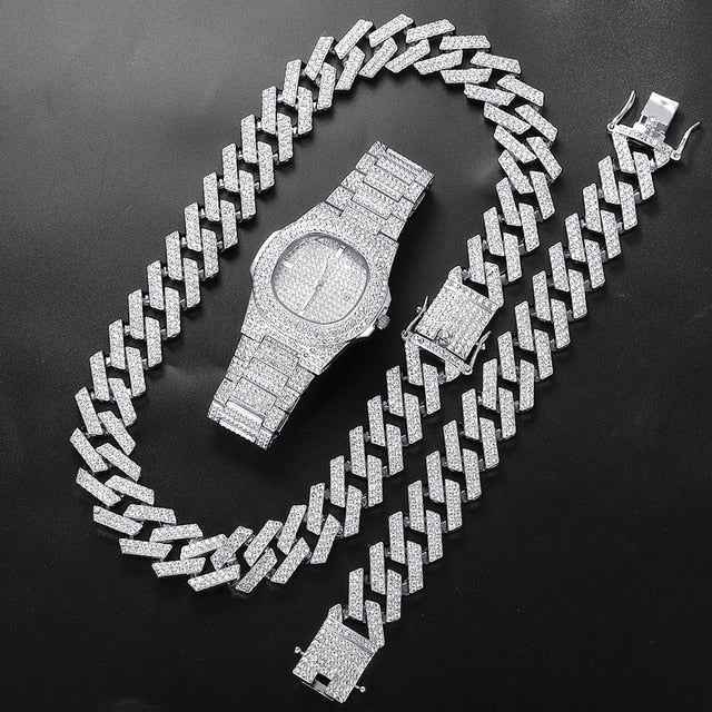 Silver Cuban link chain set featuring a diamond-encrusted bracelet and watch for a luxurious look
