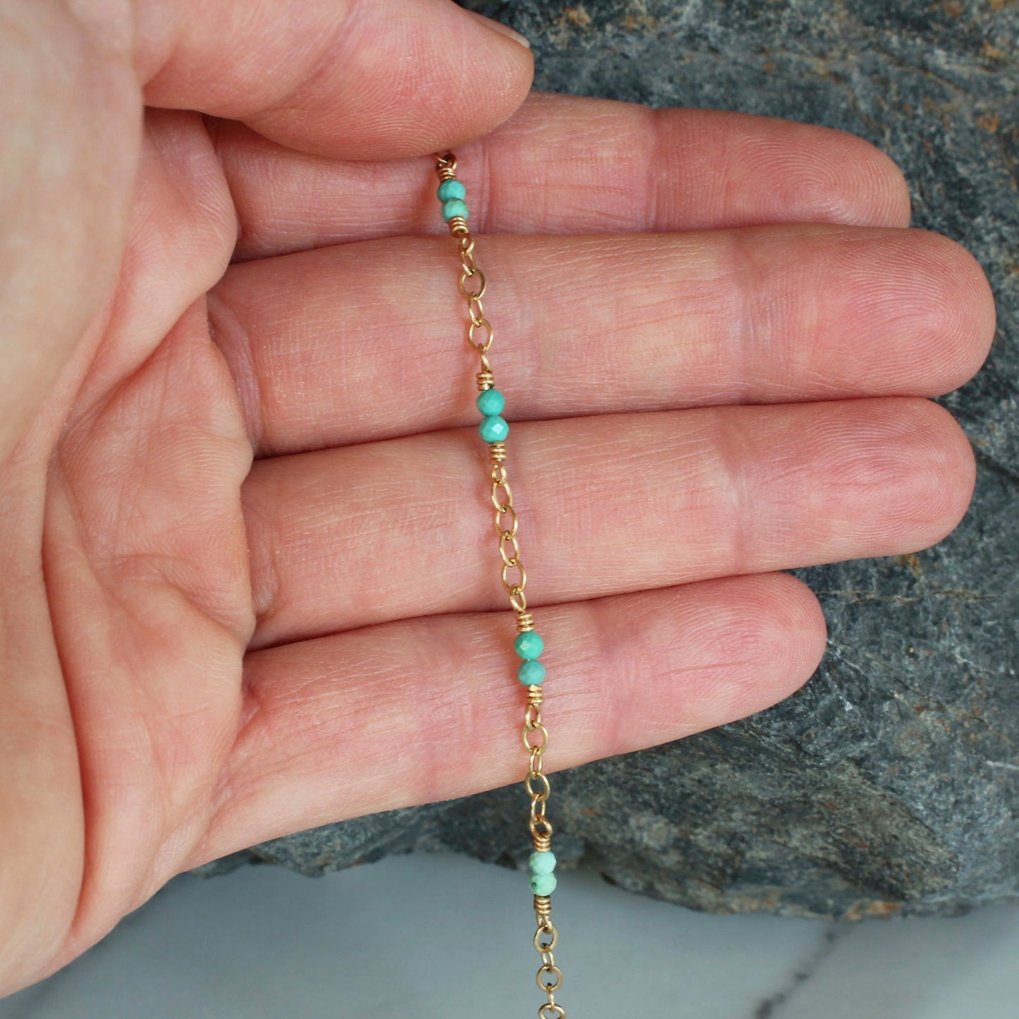 Elegant turquoise bracelet 14k gold with delicate links and vibrant turquoise beads