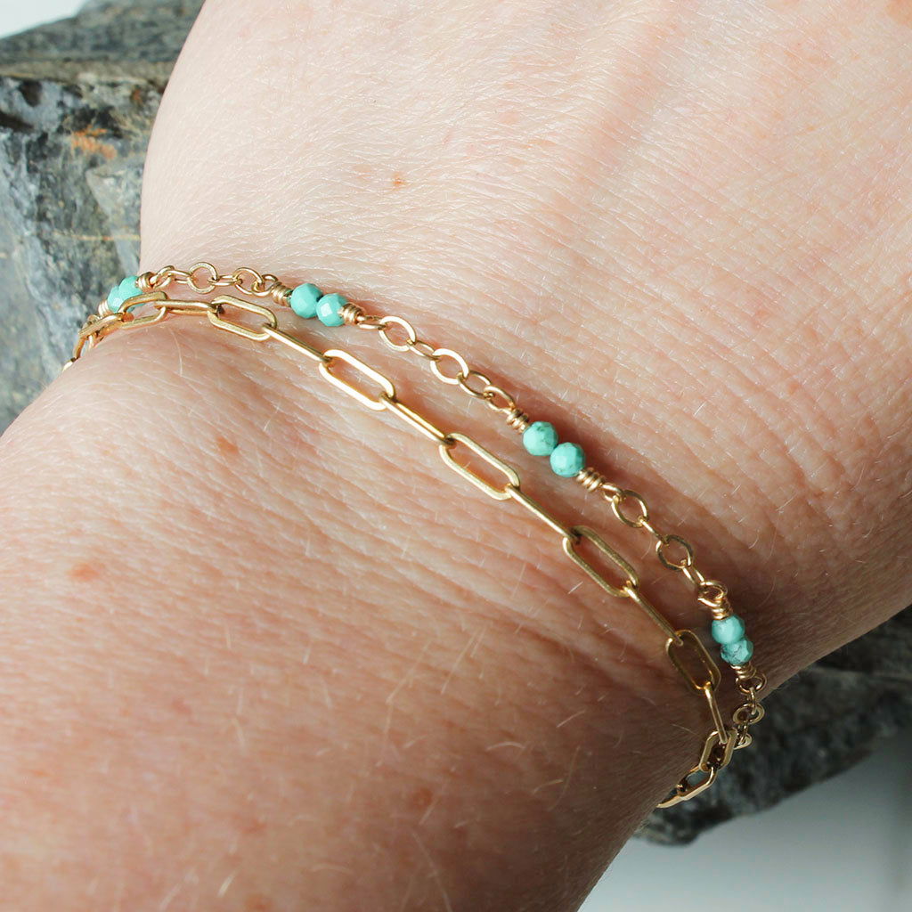 Turquoise bracelet 14k gold featuring delicate links and small turquoise beads