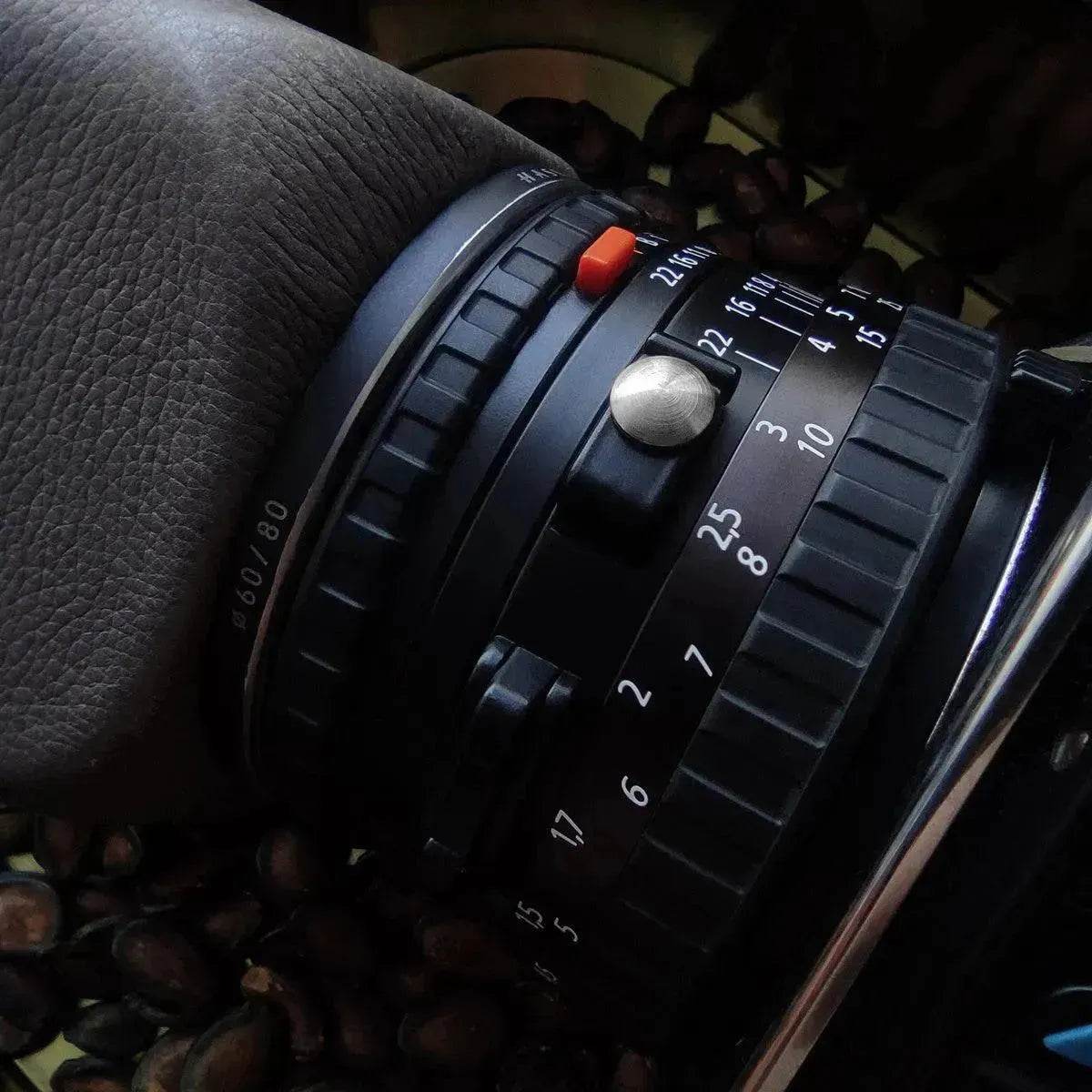 Universal PC port metal dust plug for film cameras - www.Shopthatapp.com