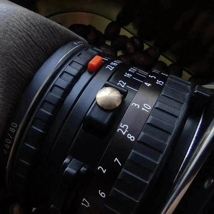 Universal PC port metal dust plug for film cameras - www.Shopthatapp.com