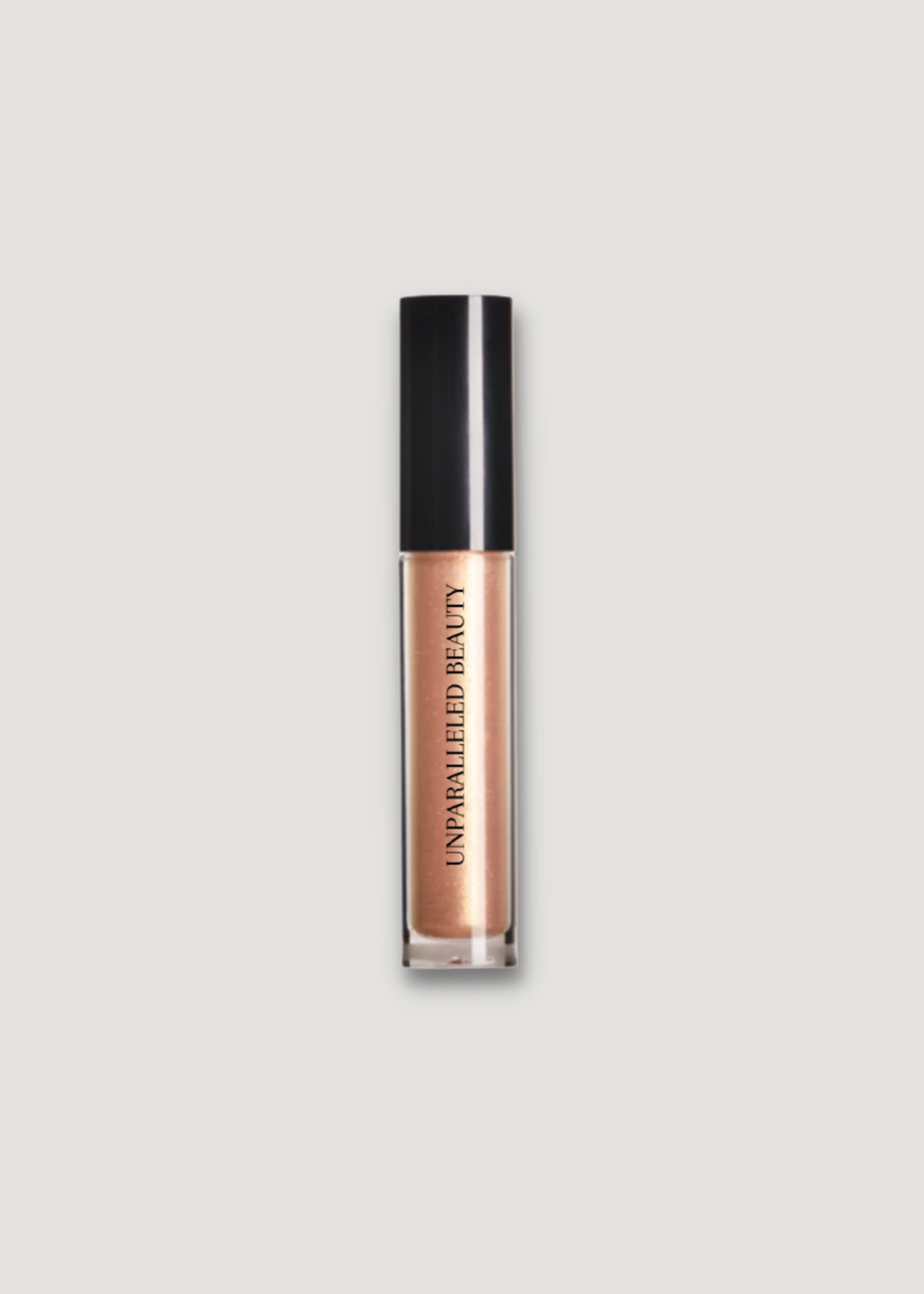 UNPARALLELED BEAUTY Gold Lip Gloss - Shimmering Shine - www.Shopthatapp.com