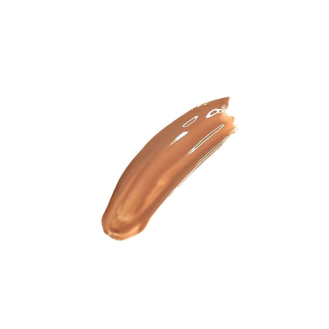 UNPARALLELED BEAUTY nude lip gloss swatch showing a smooth, creamy texture for a natural finish