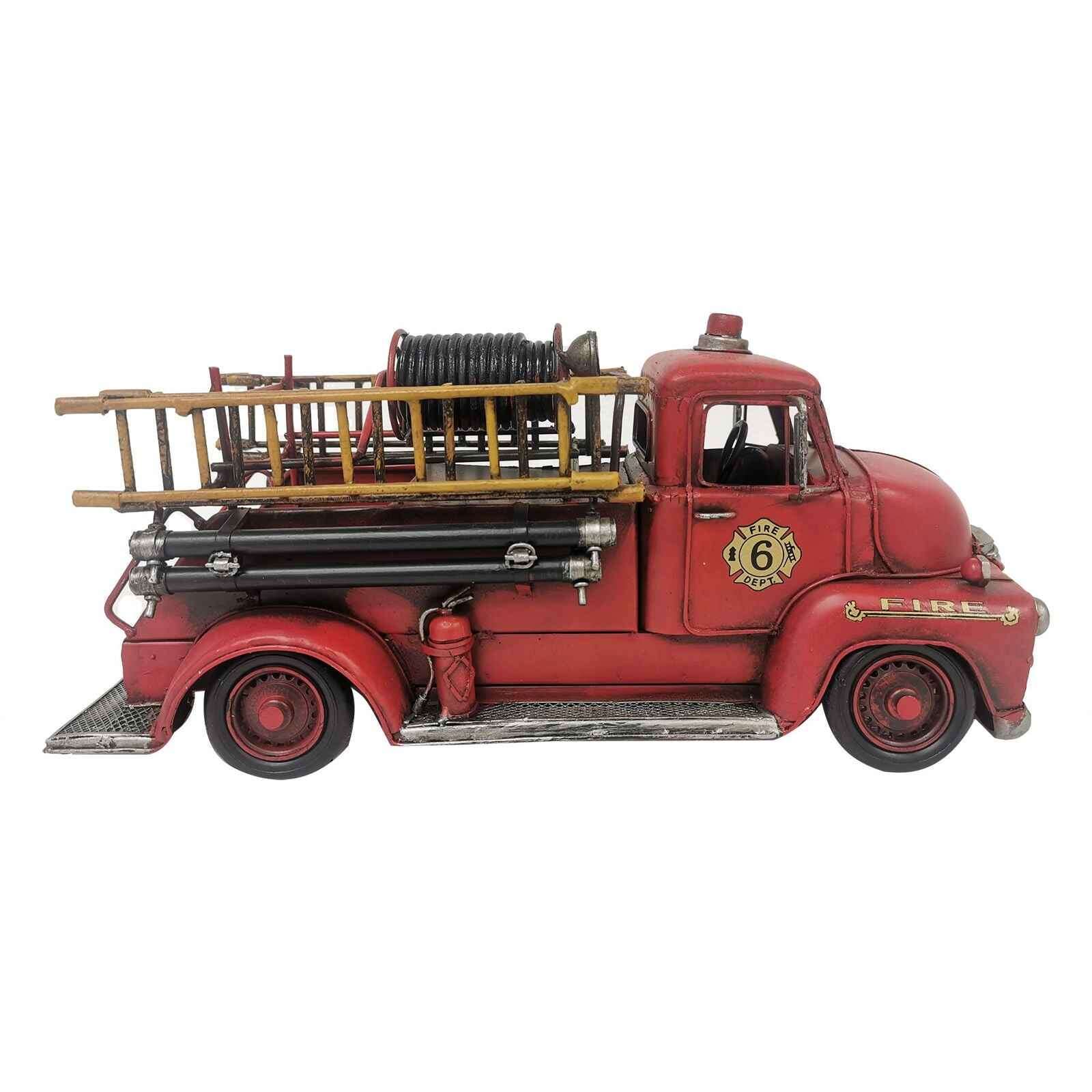 Vintage fire truck model in red with ladder and hose details for home decor