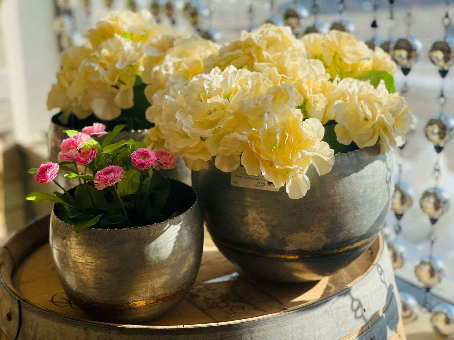 Viola planter set sale featuring large and small metallic pots with yellow and pink flowers