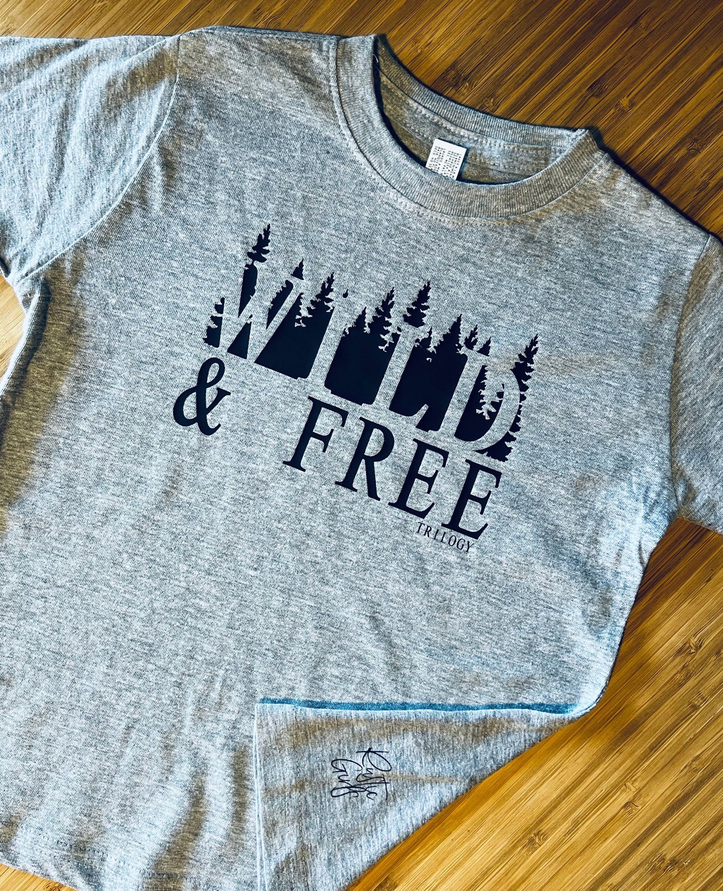 Wild and Free kids t-shirt in gray with forest graphic for playful outdoor adventures